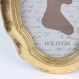 Vintage képkeret 15 × 10 cm – rózsás, ovális, arany