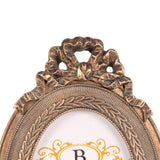 Vintage képkeret 6 × 9 cm – ovális, arany