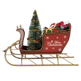 Piros fém szánkó ajándékkal Merry Christmas felirattal