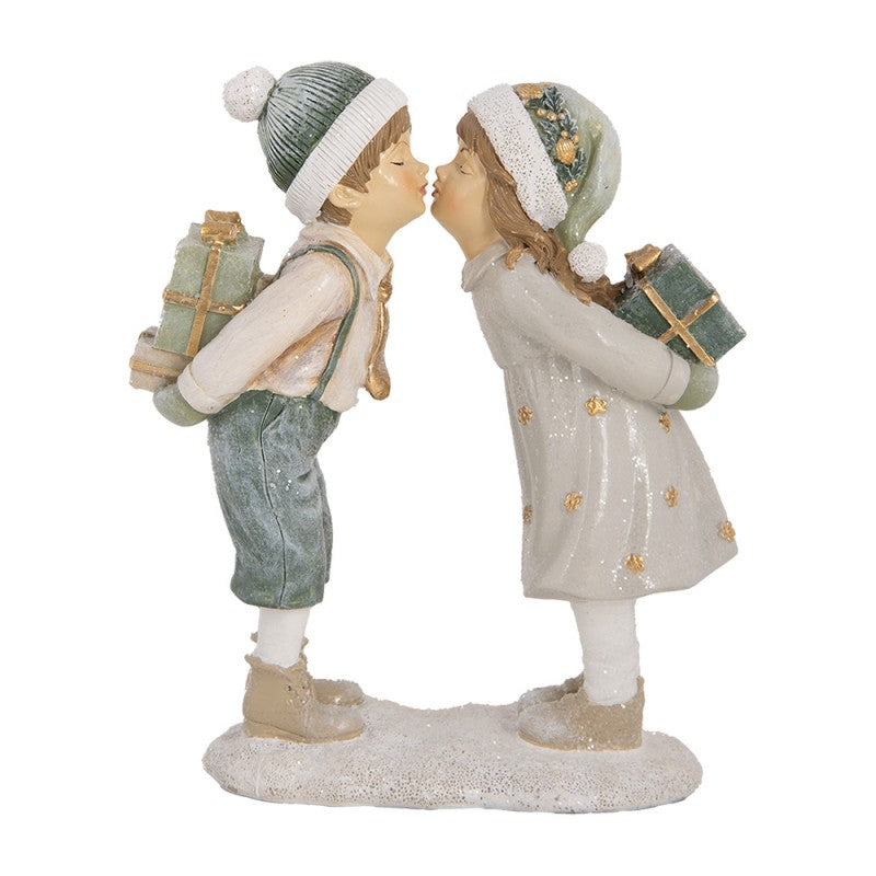 Puszilkodó gyerekek csomagokkal karácsonyi figura