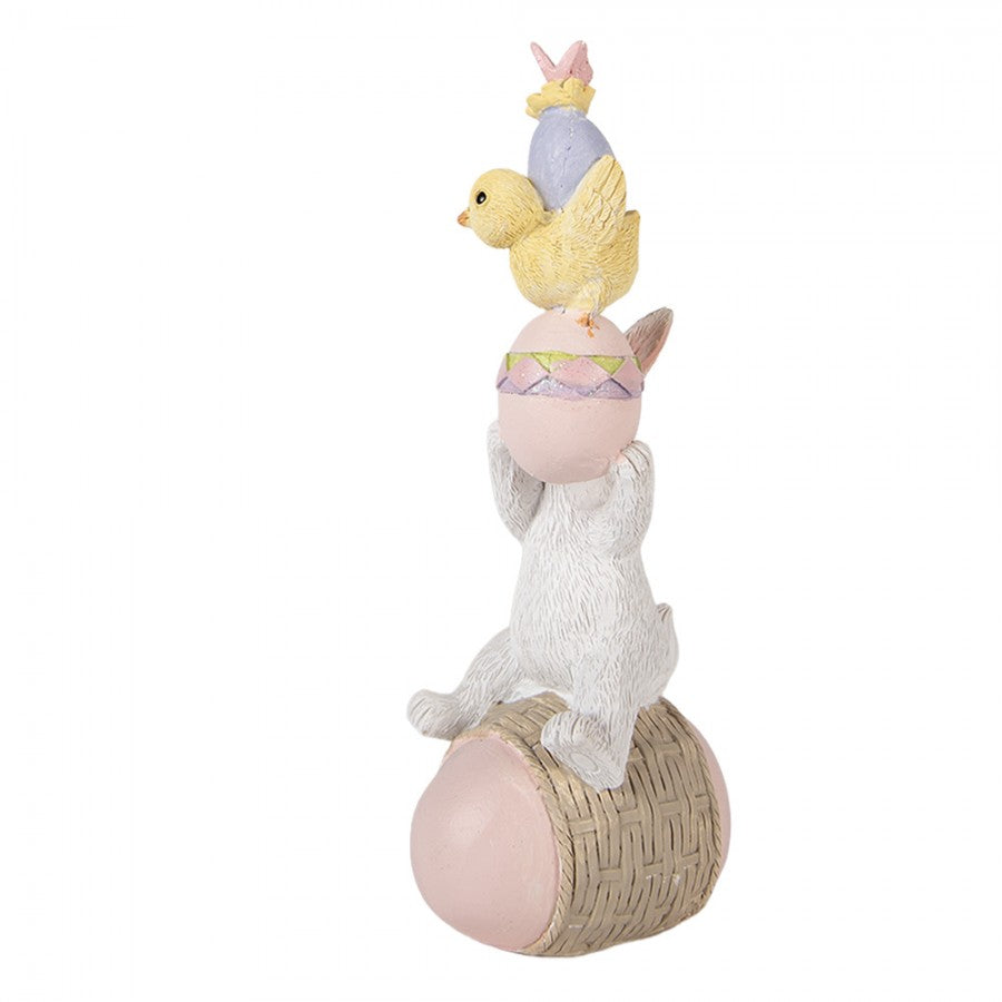 Húsvéti dekoráció figura Tojáson ülő fehér nyuszi csibét tartva 19 cm