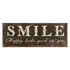 Dekoráció Antikolt barna fém falitábla Smile felirattal