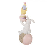 Húsvéti dekoráció figura Tojáson ülő fehér nyuszi csibét tartva 19 cm