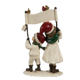 Karácsonyi dekoráció Happy Christmas táblát tartó gyerekek karácsonyi dekoráció