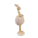 Virágszoknyás nyuszilány lufival húsvéti dekoráció figura 22 cm