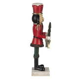 Karácsonyi dekoráció Karácsonyi Diótörő figura szett Merry Christmas táblával 35 cm