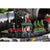 Karácsonyi dekoráció Karácsonyi városi életkép vasúttal bódé árussal zenélő világító dísz